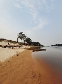 Scenic view of beach against sky