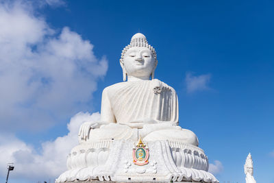 Low angle view of statue against sky