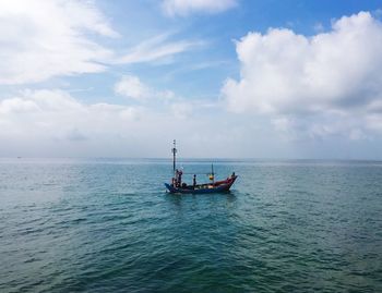 Boat sailing in sea