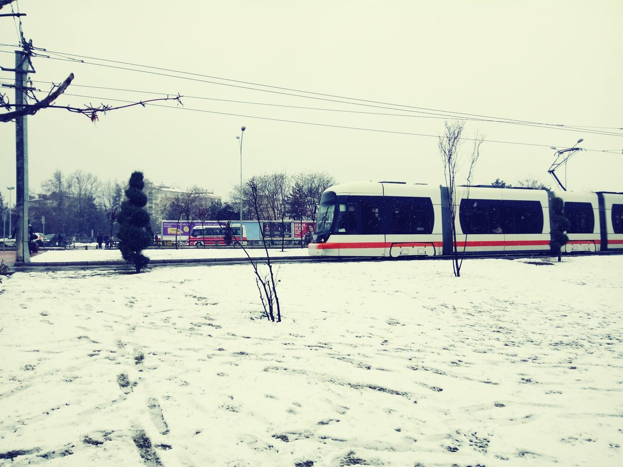 transportation, mode of transport, sky, land vehicle, outdoors, real people, day, cold temperature, architecture