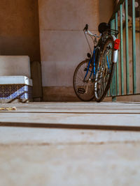 Bicycle parked against wall in building of the university of coimbra