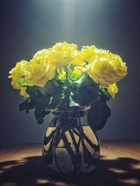 Close-up of yellow flowers in vase