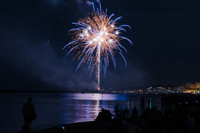 Firework display at night