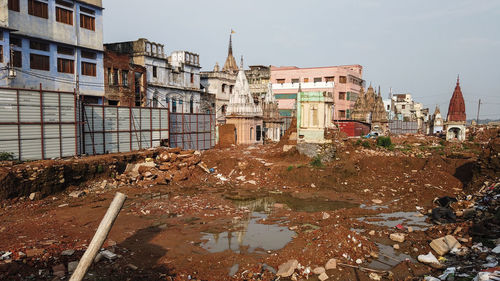 Buildings in city against clear sky