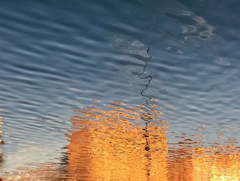 High angle view of reflection in lake against sky