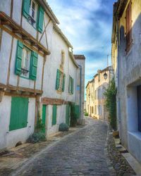 Narrow alley along buildings