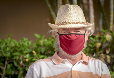 Portrait of man wearing hat