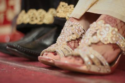 Low section of couple during wedding ceremony