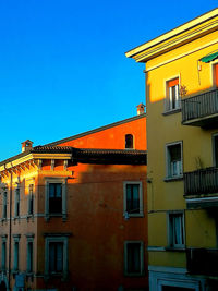 Houses against clear sky