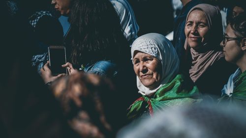 Group of people looking at camera