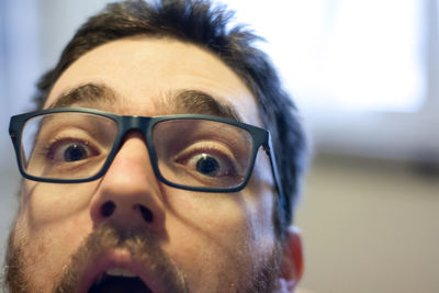 Portrait of man wearing eyeglasses