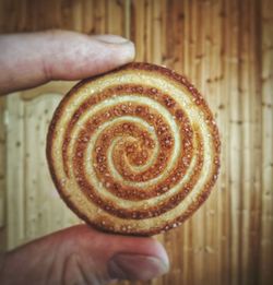 Close-up of hand holding bread