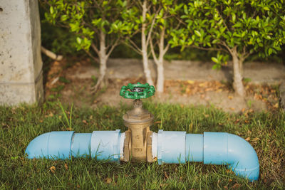 A big water pipe with valve closed.