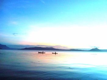 Scenic view of sea at sunset