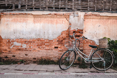 Bicycle against brick wall