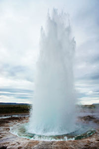 The great geysir, geyser in southwestern iceland, haukadalur valley, geyser splashing out of ground