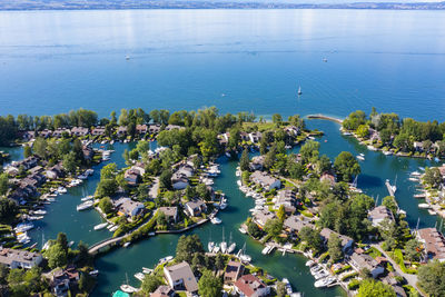 High angle view of townscape by sea