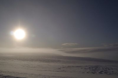 Sun shining through clouds