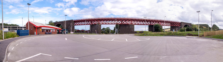 View of bridge against cloudy sky