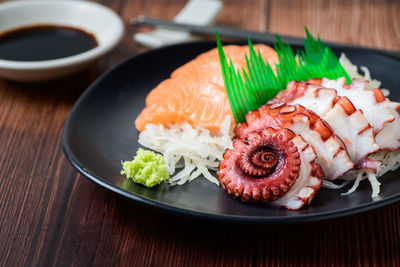 Close-up of sushi served on table