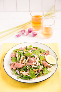 High angle view of salad in bowl on table