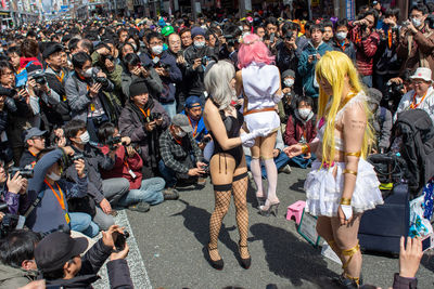 High angle view of people on street in city