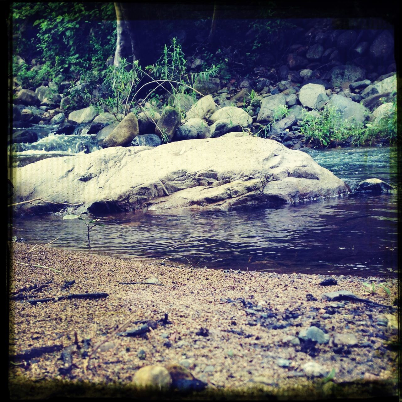 transfer print, water, auto post production filter, rock - object, nature, beach, beauty in nature, tranquility, tranquil scene, scenics, rock, shore, sea, sand, plant, rock formation, day, outdoors, stone - object, river