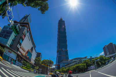 Low angle view of buildings against blue sky