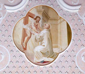 Low angle view of female sculpture on ceiling