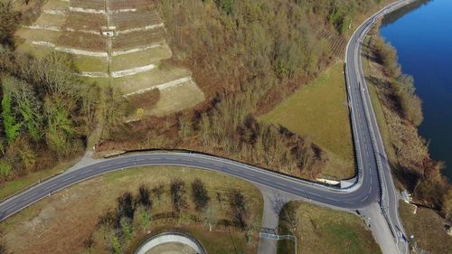 High angle view of road amidst trees