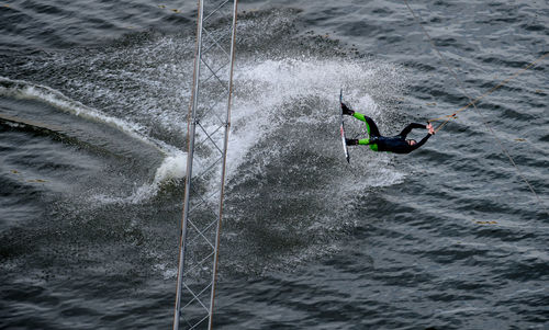 Man kiteboarding in sea