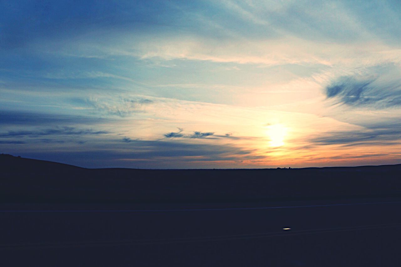 sunset, sky, scenics, tranquil scene, silhouette, tranquility, beauty in nature, cloud - sky, orange color, nature, idyllic, sun, landscape, cloud, mountain, sunlight, outdoors, no people, non-urban scene, cloudy