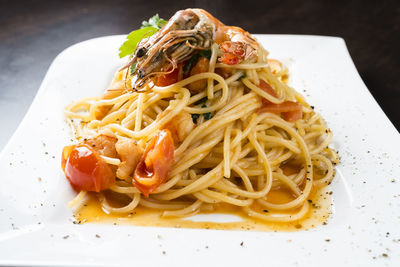 Close-up of pasta served in plate