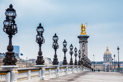 View of street light against building in city