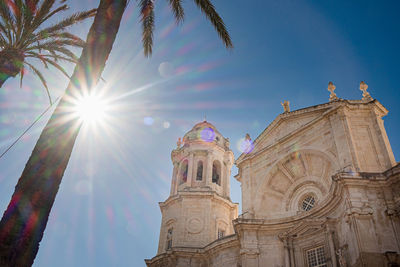 Low angle view of sunlight streaming through a building