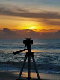 Scenic view of sea against sky during sunrise