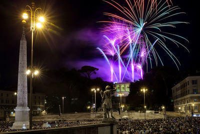 Fireworks in piazza del popolo in rome, on the occasion of the patron saint, peter and paul.