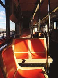 View of red seats in train