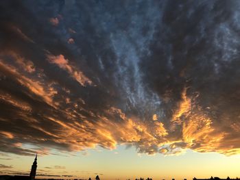 Low angle view of dramatic sky during sunset