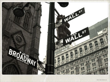 Low angle view of road sign against building