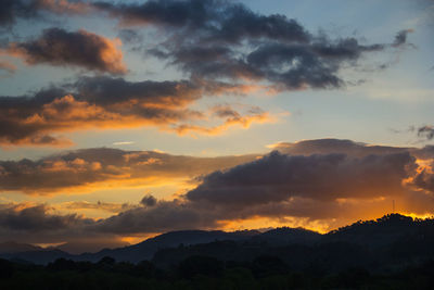 Scenic view of dramatic sky during sunset