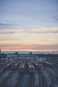 High angle view of train against sky at sunset