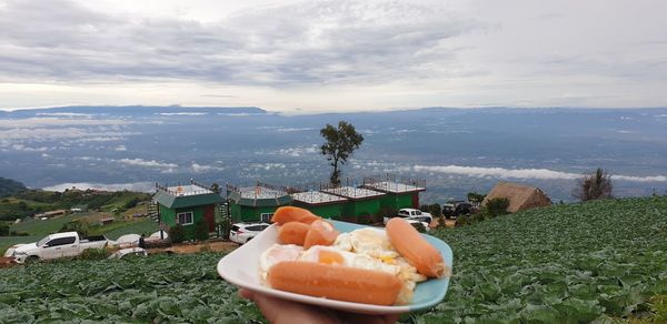 View of food on shore against sky