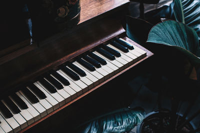 High angle view of man playing piano