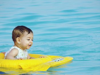 Cute girl in swimming pool