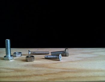 High angle view of metallic table against black background