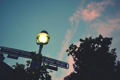 Low angle view of street light against sky