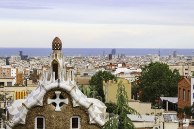 Panoramic view of buildings and houses against sky