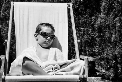Boy with sunglasses in the sun