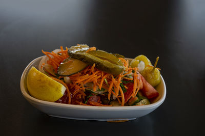 Close-up of salad in bowl on table